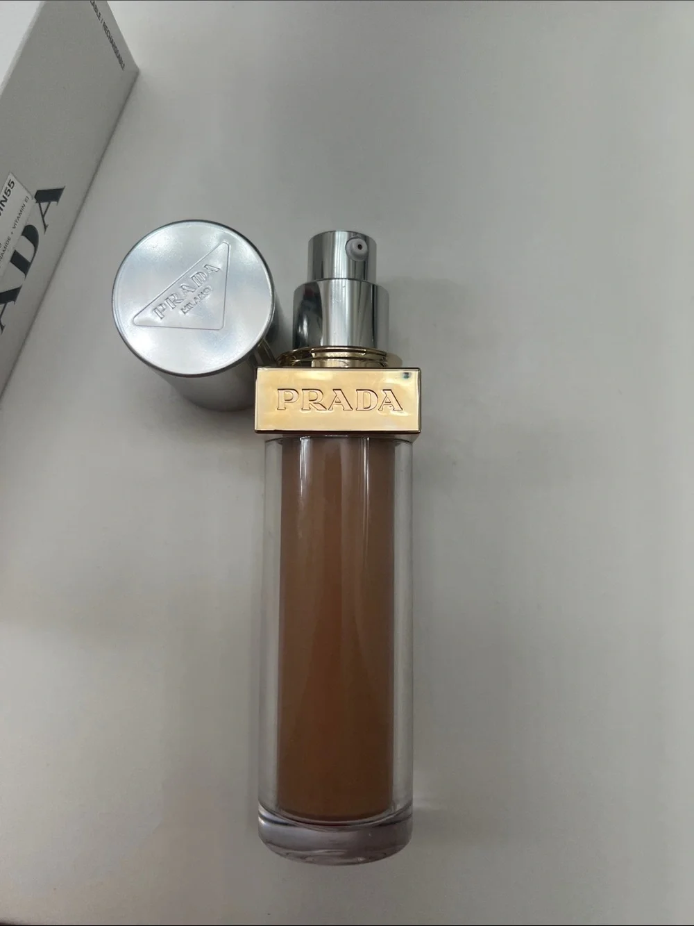 PRADA REVEAL skin optimizing foundation Lactobacillus, niacinamide, Vit E, MN55